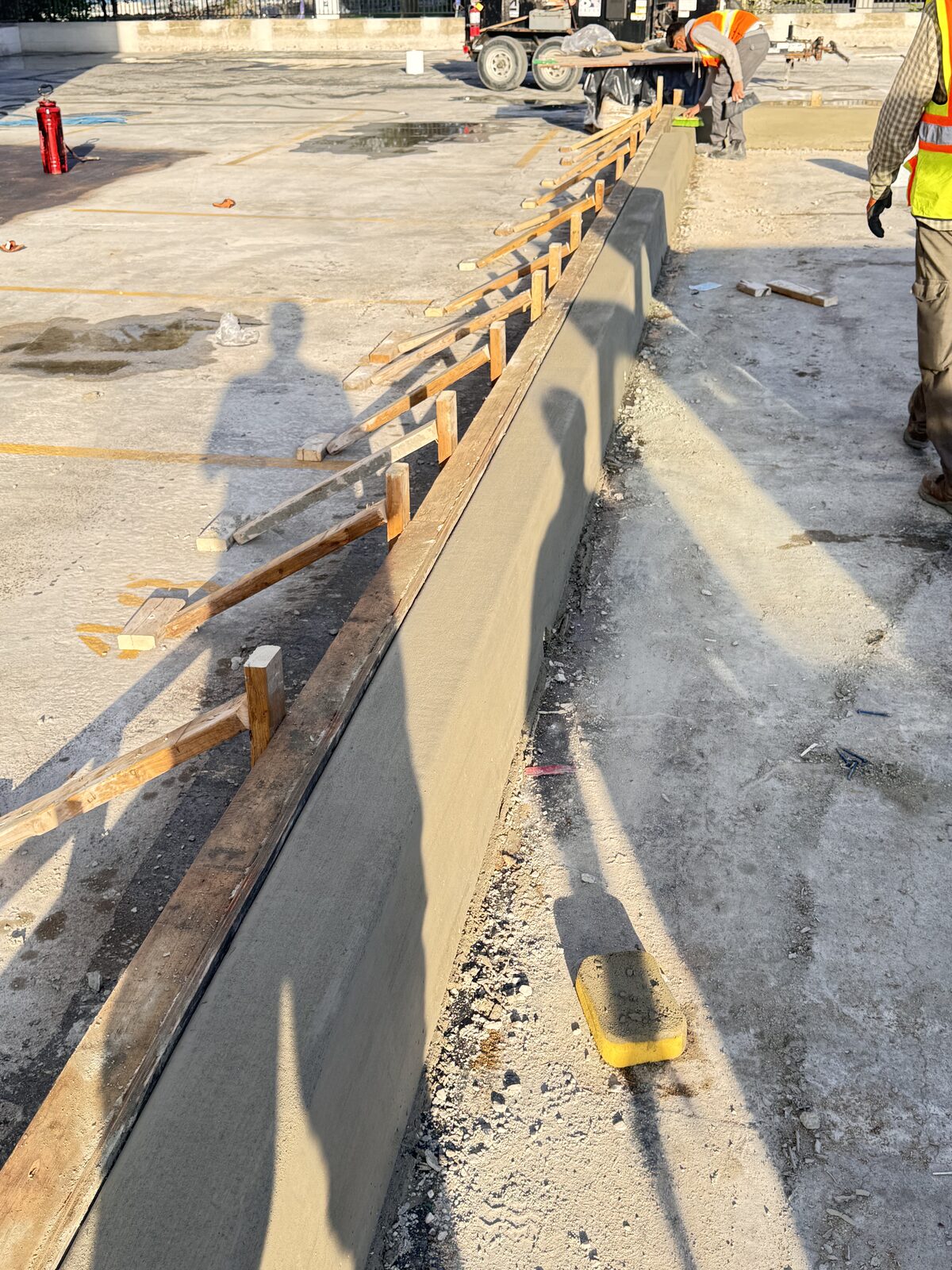 Black retaining wall in progress